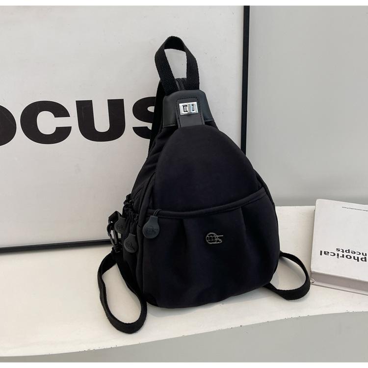Oblique span small bag breast bag 2025 new commuter leisure backpack light outdoor riding single shoulder oblique span bag 21*13*25 чёрный