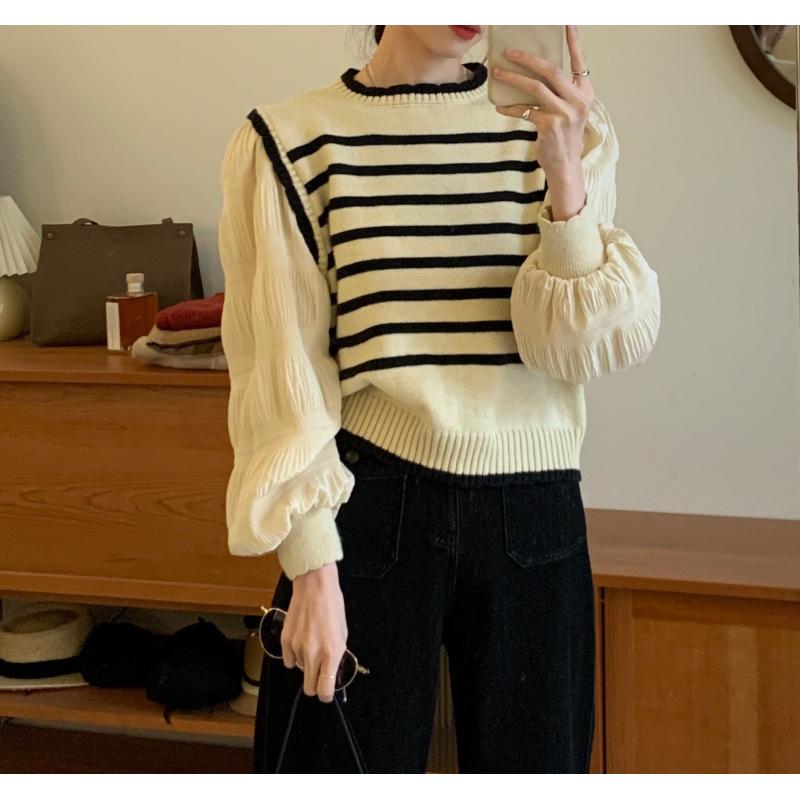 

Autumn new black and white striped splicing fake two-piece sweater knitted sweater women s design bubble sleeve top one size fits all