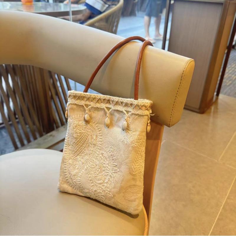 Shell tassel pendant, jacquard embroidery linen bag, literary jute mobile phone, mini crossbody vertical