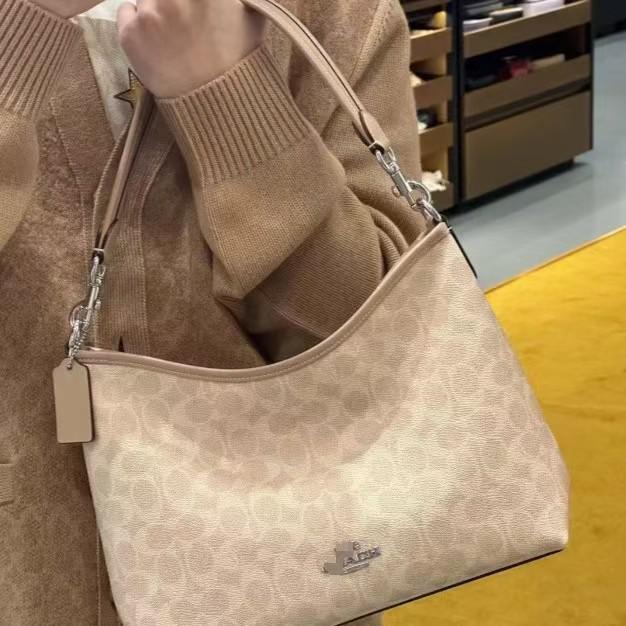 Coach Laurel Hobo Bag: Versatile, Large-Capacity Shoulder, Crossbody, and Handbag for Women.