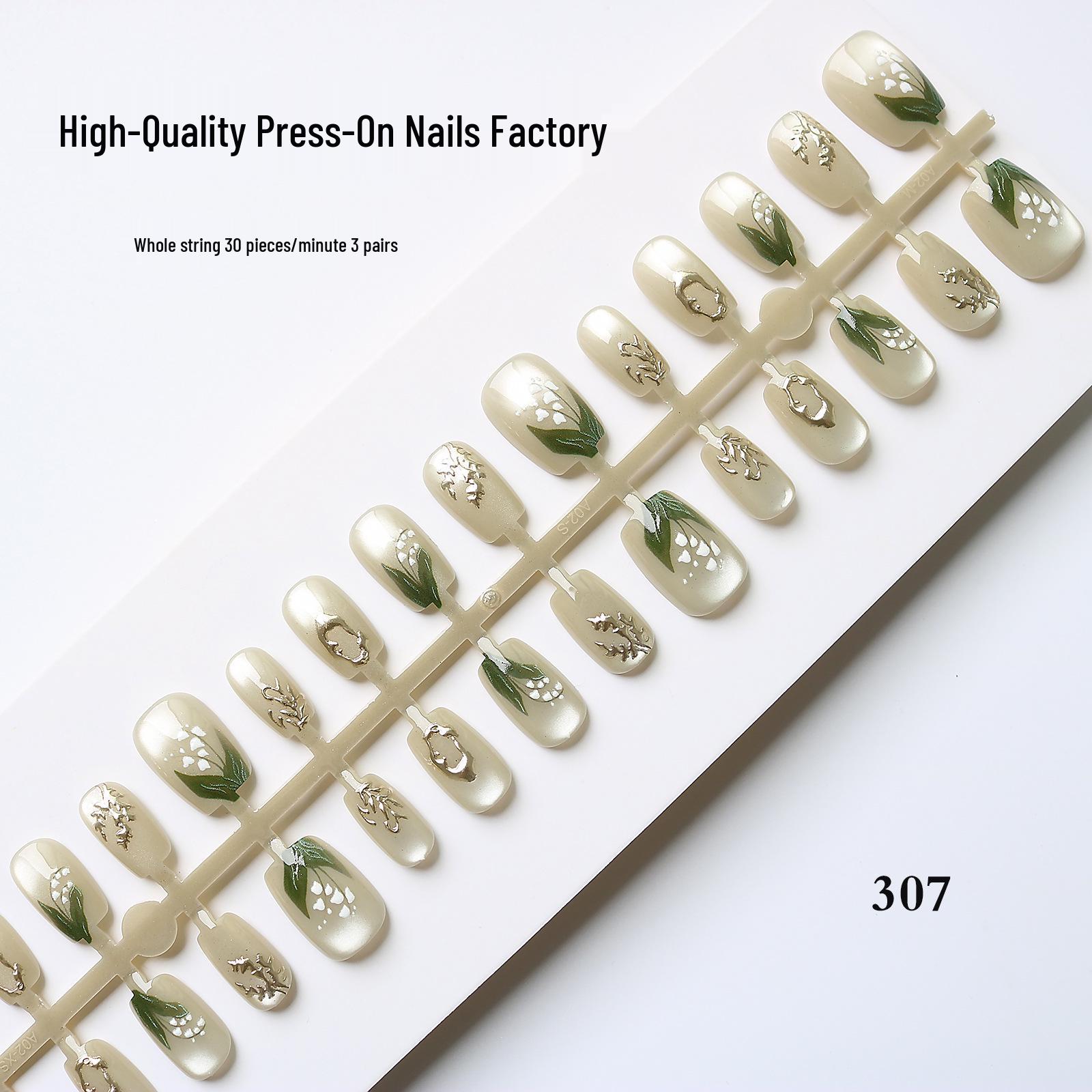 High-Quality Cat Eye Glass Nail Tips with Gilded Lily of the Valley Design
