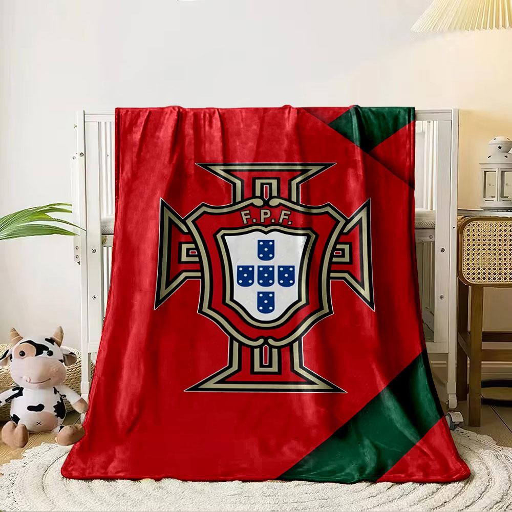 A red background with a central badge featuring a shield and cross design. for all seasons blanket lunch break throw gift