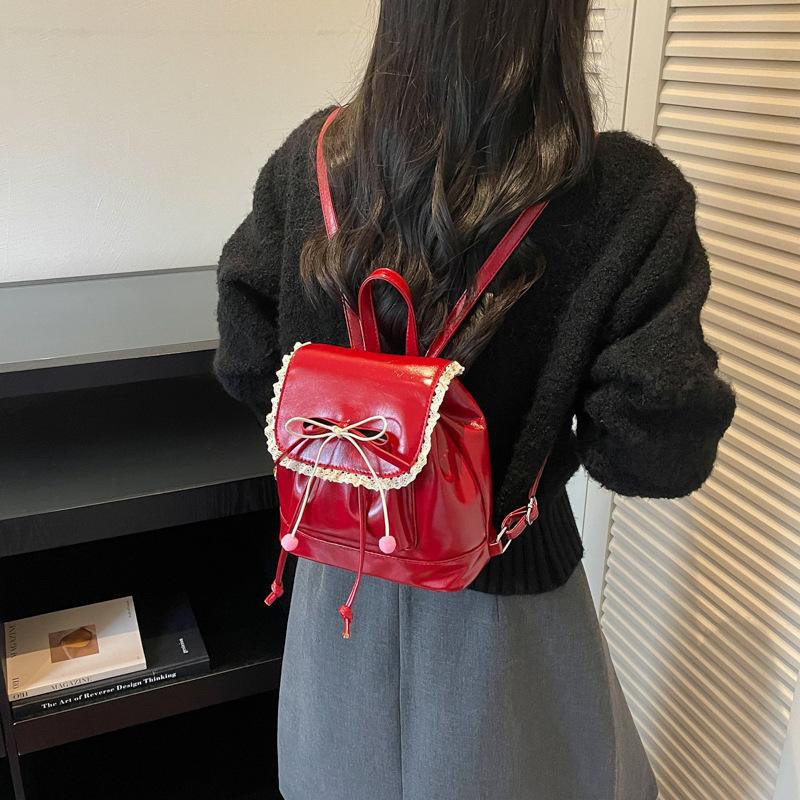 Schoolbag Korean version of high-end simple and versatile lightweight backpack bag women's 1011 summer new high-end cute small backpack