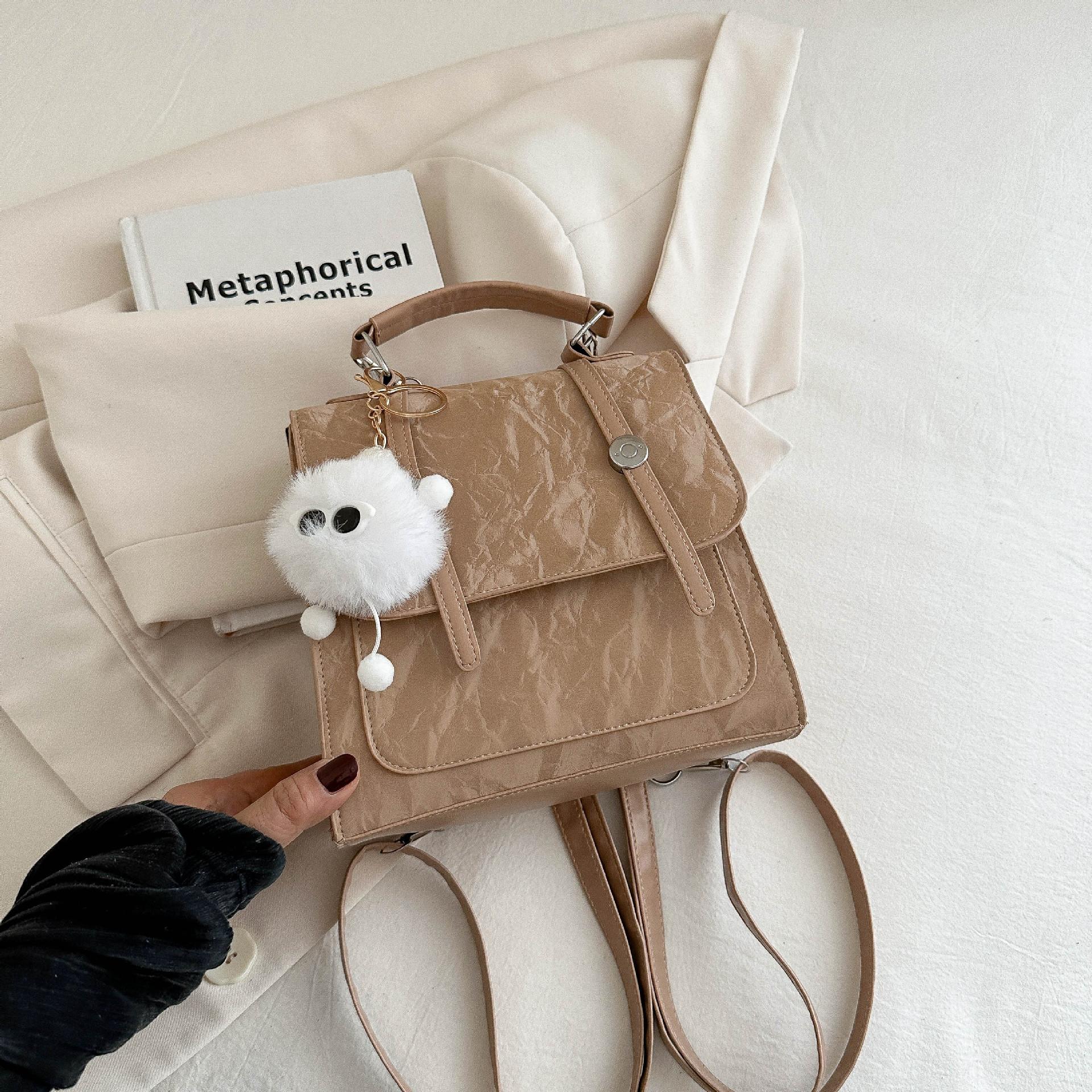 

Повседневное чувство моды и зарубежный стиль 2025 кулон лето новая корейская версия студенческого стиля простая портативная трендовая женская сумка с двойным плечевым ремнем Without pendant хаки