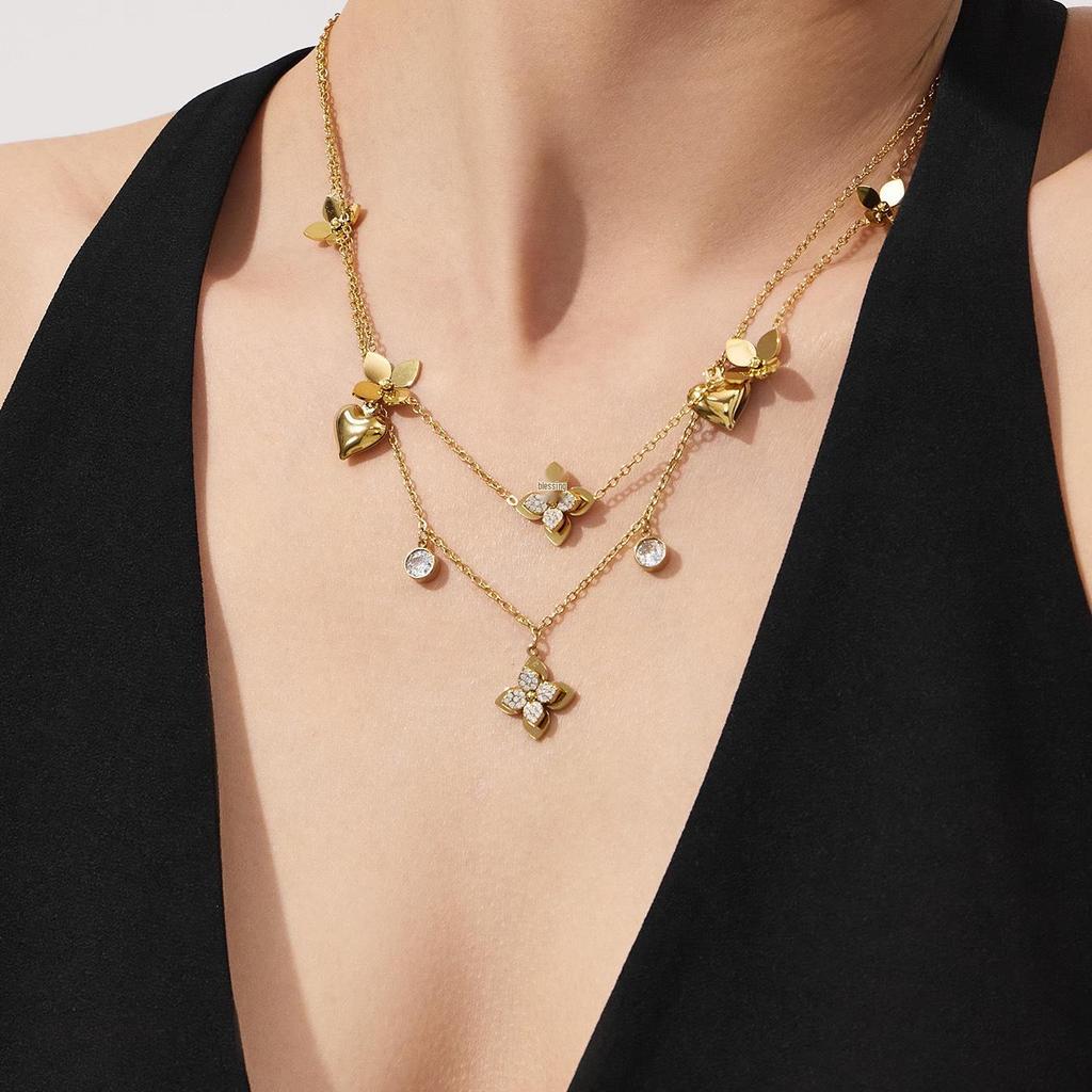 Set di Gioielli di Moda Europeo-Americano: Collana, Bracciale, Orecchini in Acciaio Inossidabile Placcato Oro 18K con Fiori di Zirconia.