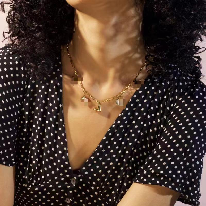 European & American Luxury White Mother-of-Pearl Flower V-Shaped Titanium Steel Necklace - Non-Fading, Niche Design