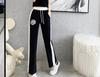 Elegant Women's Summer Casual Suit: Stylish Wide-Leg Pants Two-Piece Set for an Age-Reducing Street Style.