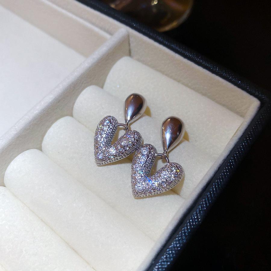 Silbernadel Zirkon Schlangenherz Ohrringe: Elegante, Einzigartige High-End Ohrstecker für Damen