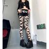 Gothic Punk Cutout Strümpfe: Schwarze zerrissene Netzstrumpfhosen für einen ausgefallenen Subkultur-Stil.
