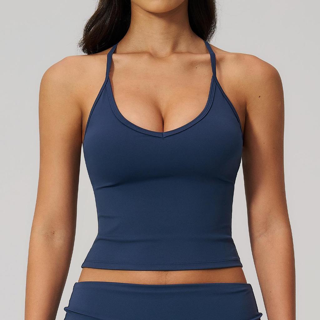 Introducing the Stylish Women's Quick-Dry Yoga Tank Top: Beautiful Design, Perfect for Fitness & Sports.