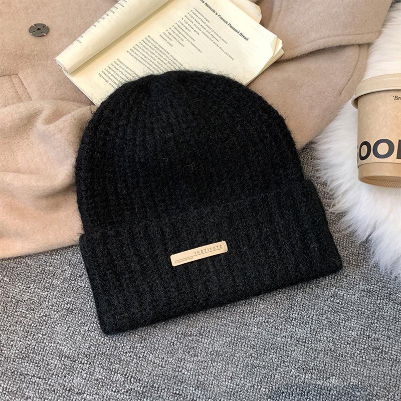 Gray knitted wool hat women's winter versatile warm pile hat showing face small cold hat ear protector bag head hat
