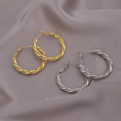Vintage Korean Niche Design Twist Hoop Earrings: Fashionable, Versatile, and Plain.