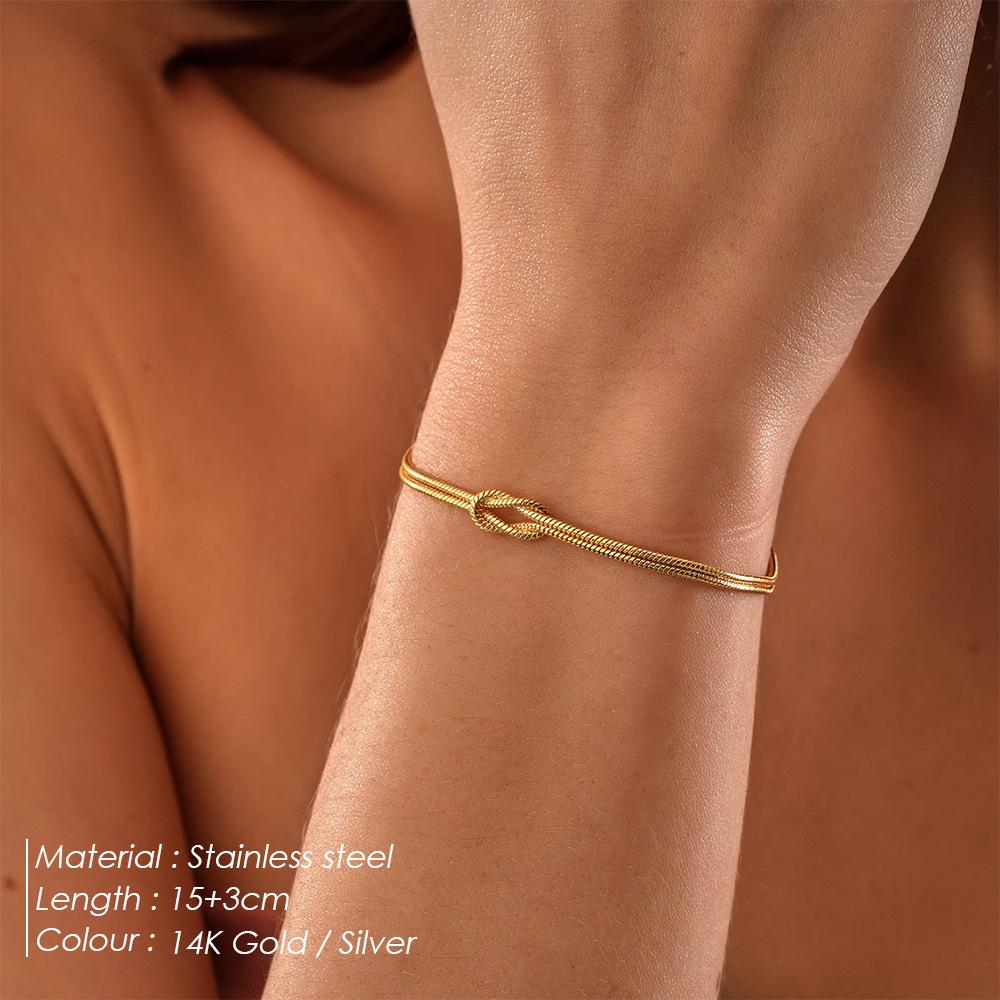 St. Delan Stainless Steel Cross Knotted Snake Bone Bracelet