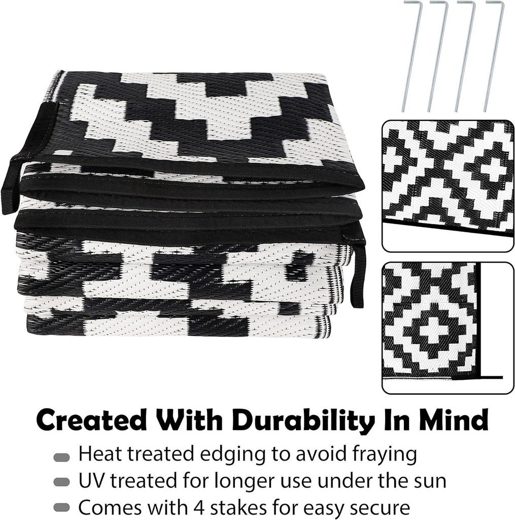 Feuchtigkeitsbeständige Schwarz-Weiß-Kreuz-Außenmatte für Wohnmobile und Camping – Langlebige, tragbare Hofplane