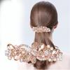 Korean Rhinestone Bow Hair Clip: Crystal Spring Ponytail Accessory for Women.