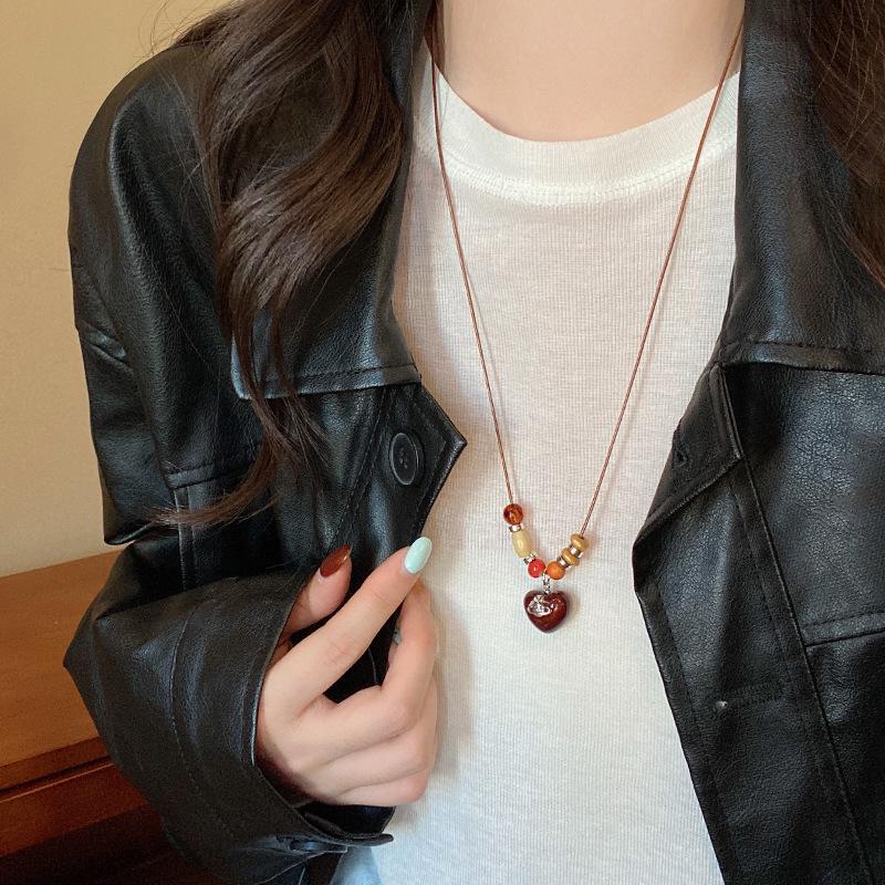 Retro Chinese Tassel Necklace: Unique Ethnic Style Women's High-End Clavicle Chain.