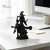 Matte Black Witch Statue Gothic On Broom Statue, 3D Printed Spooky Tabletop Figurine for Small Shelf Home Party, Halloween Desk Decor with Pointy Hat,