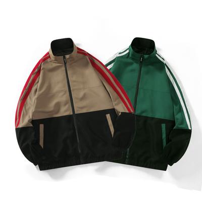 Jaqueta masculina de cor contrastante com emenda de novo estilo primavera e outono, gola alta, jaqueta de rua alta, moderna, top solto de dois pólos