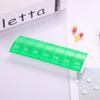 Creative Rectangular Seven-Day Mini Medicine Box - Portable Plastic Pill Organizer with Seven Compartments.