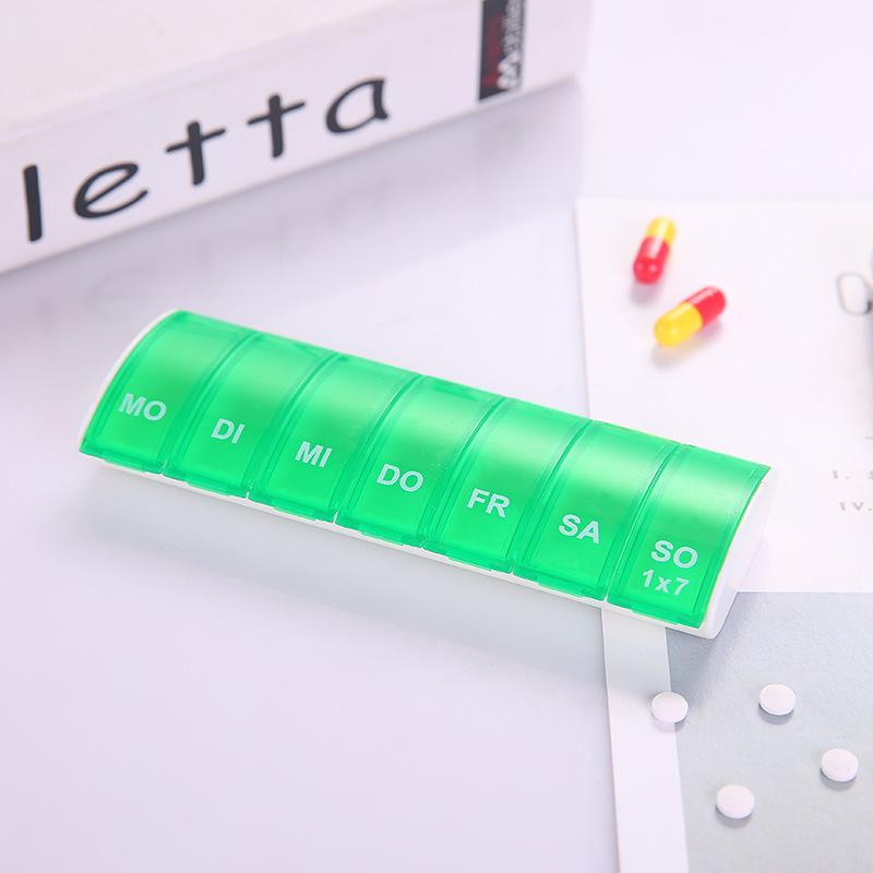 Creative Rectangular Seven-Day Mini Medicine Box - Portable Plastic Pill Organizer with Seven Compartments.
