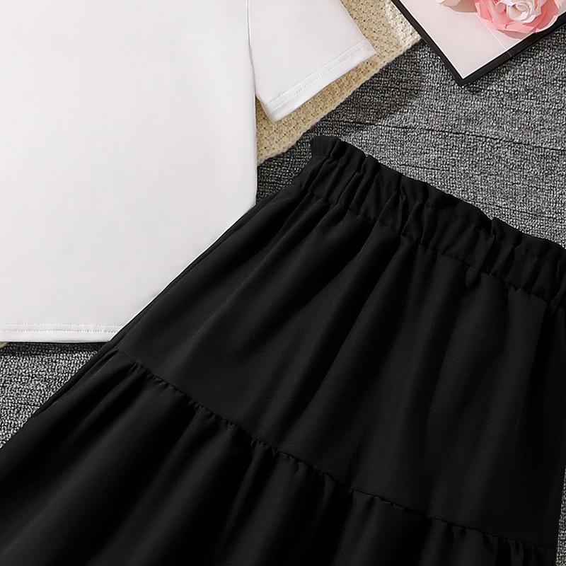 Mädchen Set Kinderkleidung 2025 Sommer Weißes Kurzarm-T-Shirt und schwarze Röcke 2-teiliges Set Casaul Outfit