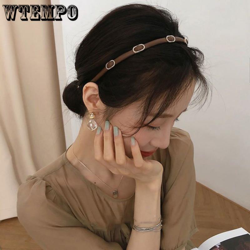 

Южная Корея Senior Sense of Pearl Leather Thin Hair Band Женская осень и зима Темперамент Простой Ретро Универсальный головной убор