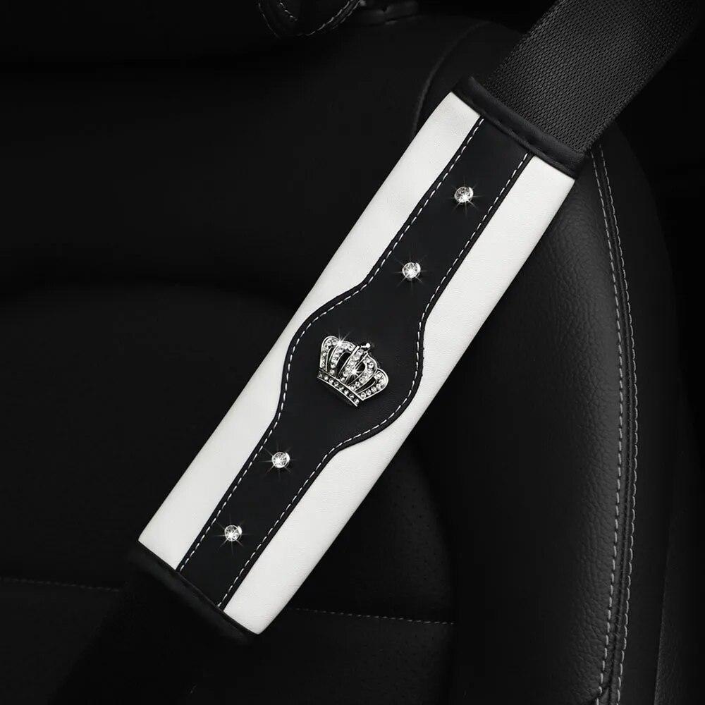 A Stereo Leather Car Seat Belt Shoulder Protector with a Rhinestone Crown and a Car Accessory with an Insurance Belt Cover