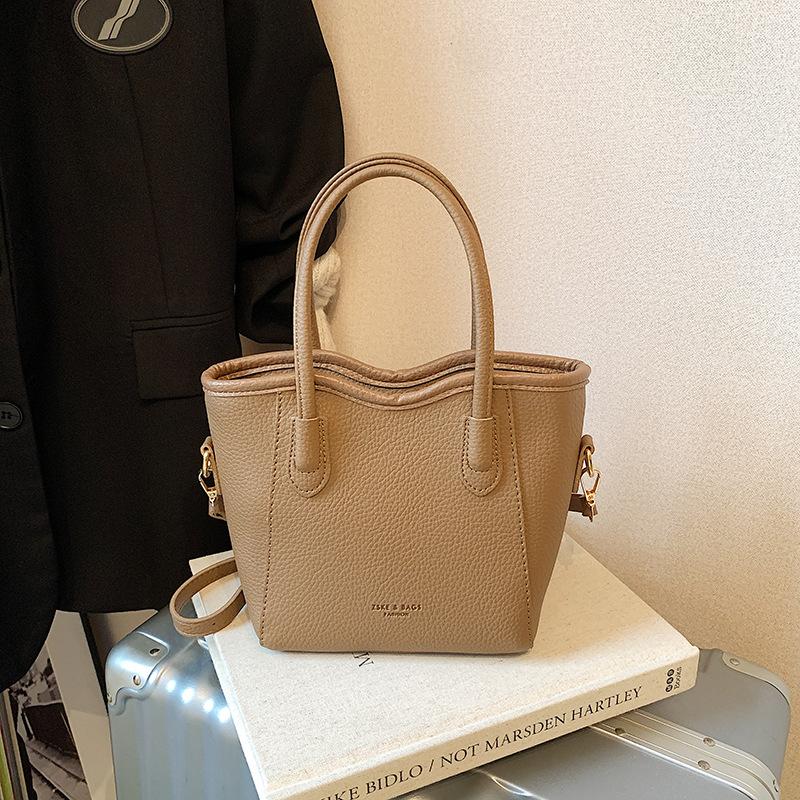 Premium Textur ausländischer Stil tragbare Bucket Bag Damen 2025 neu vielseitige Mode Gemüsekorb einzelne Schulter Messenger Damenhandtasche