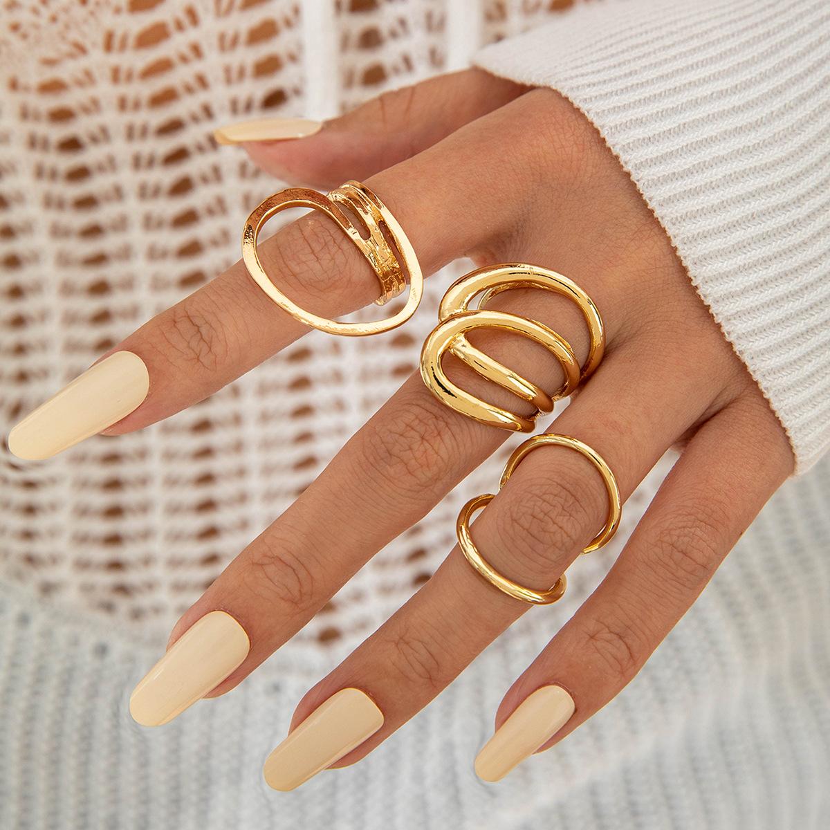 

New cold wind bow irregular hollow opening ring, texture flower ring