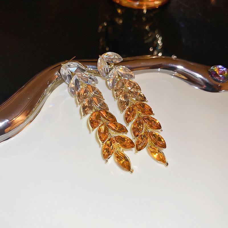 

Серьги-кисточки с листьями, инкрустированные стразами, для женщин, роскошные темпераментные висячие серьги, модные серьги-шармы с прогрессирующим цветом, циркон жёлтый