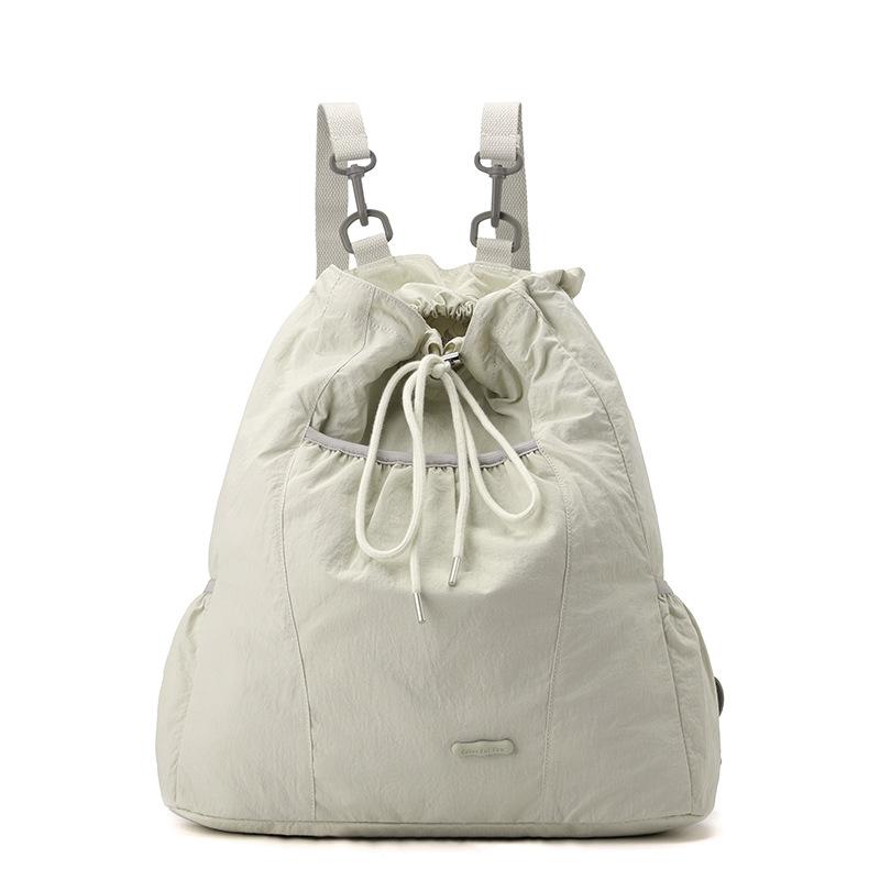 Niche design women's casual backpack college wind lightweight drawstring backpack