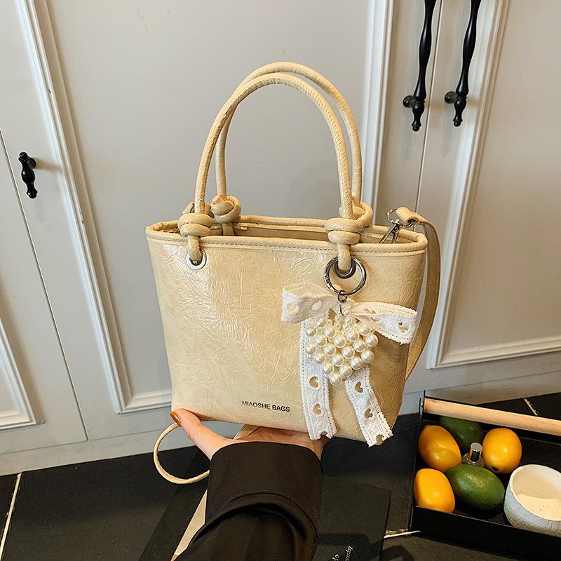 Beliebte kleine Taschen Damen Frühling und Sommer 2025 Neue Umhängetaschen Modische tragbare Beuteltaschen