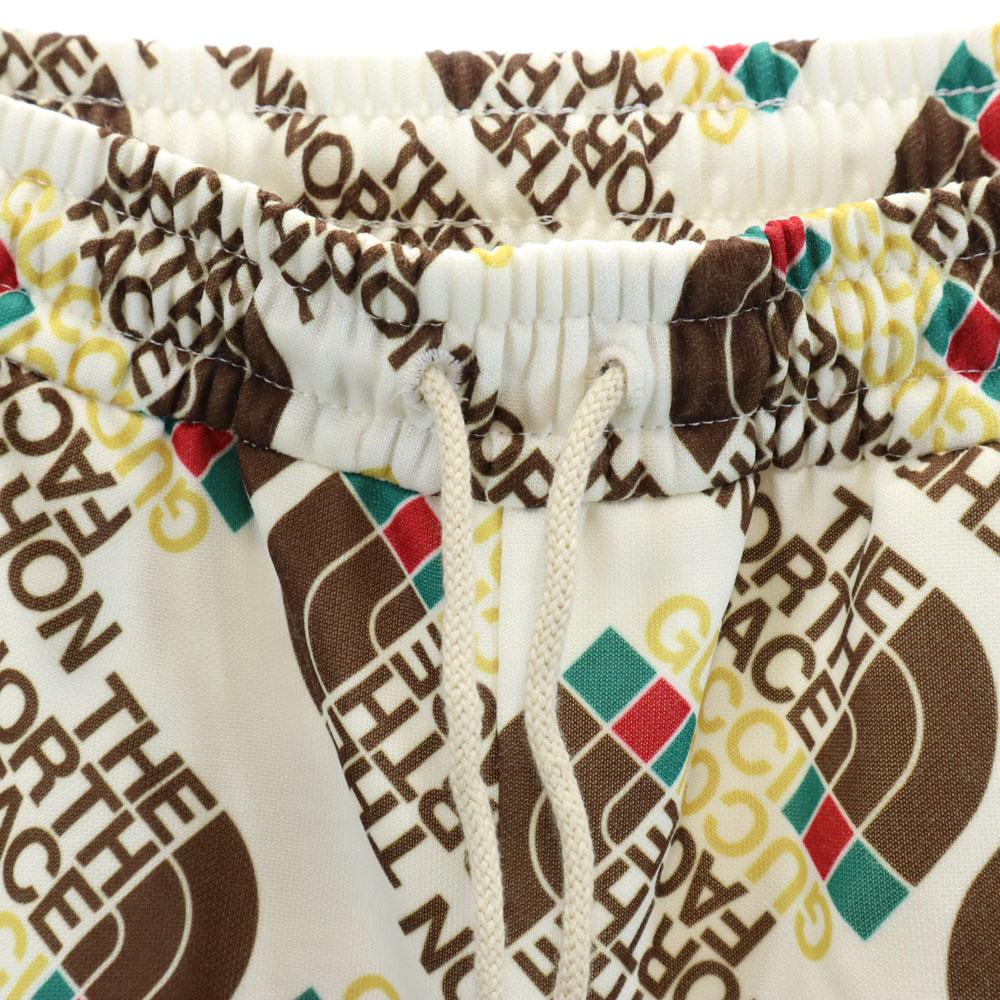 Nieużywane GUCCI Made in Italy kolaboracja North Face Spodnie dresowe z logo Total Męskie Używane