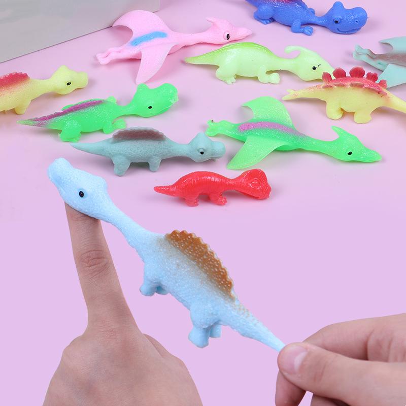 1PC Creative Dinosaur Finger Toys Kids Funny Cartoon Animals Anxiety Stress Relief Shooting Playing Toy Slings Catapult Game