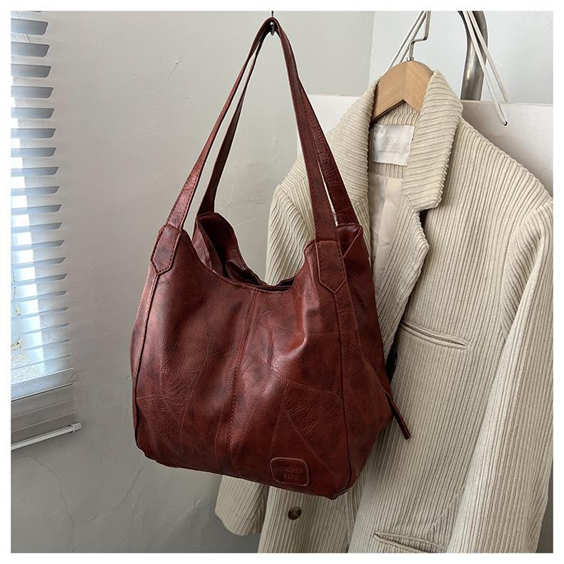 

Сумка женская новая модная мягкая кожаная сумка через плечо большой вместимости универсальная модная сумка-мессенджер корейская версия женская портативная сумка-тоут тёмно-рыжий