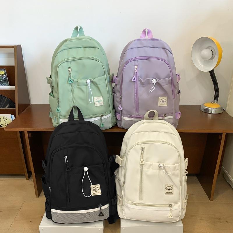 A Universal Nylon Large-capacity Korean-style Backpack with A Simple and High-quality Campus Design
