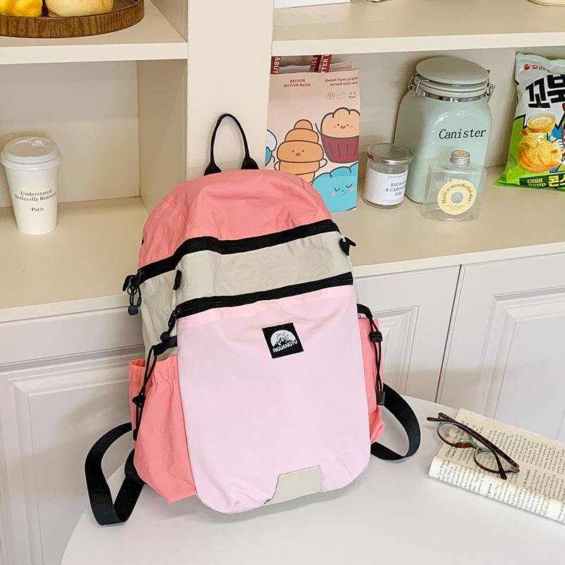 

Нишевый школьный рюкзак в сочетании цветов, весенне-летний нейлоновый рюкзак-ведро, новая универсальная дорожная сумка 2025