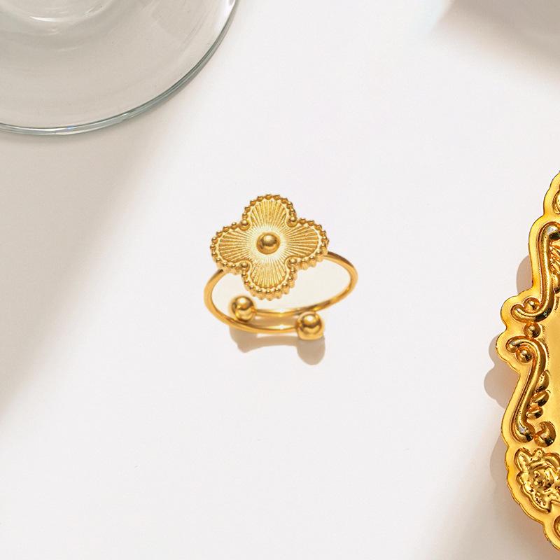 Elegant Four-Leaf Clover Necklace & Bracelet Set - Titanium Steel, Laser-Cut Design, Stylish for European & American Fashion.