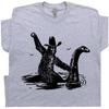 Funny Bigfoot T Shirt Cool Loch Ness Monster Shirt Cool Big Foot Tshirt for Men Women Boys Riding Nessie Cryptid Shirt Sasquatch Graphic Tee