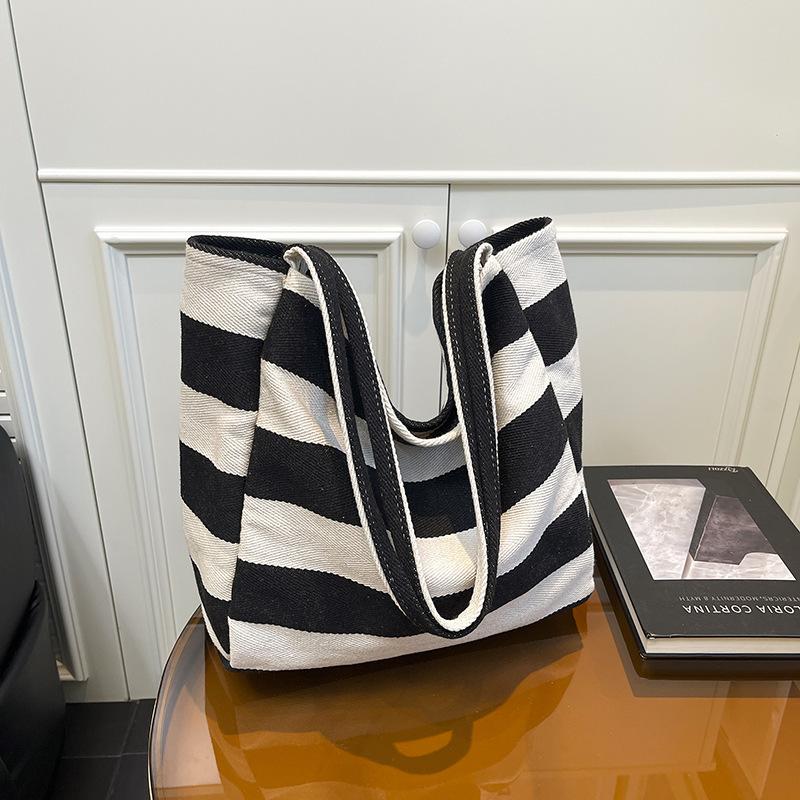 Travel bag canvas bag office worker commuter women large capacity Korean version striped fashion shoulder bag canvas bag shopping