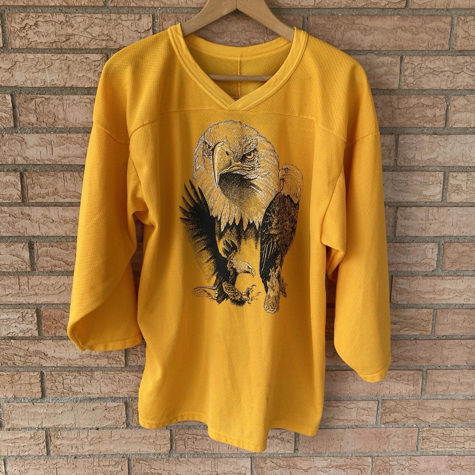 

CCM Aranda Bald Eagle 1994 X-IT! graphic v-neck yellow jersey shirt size Medium S