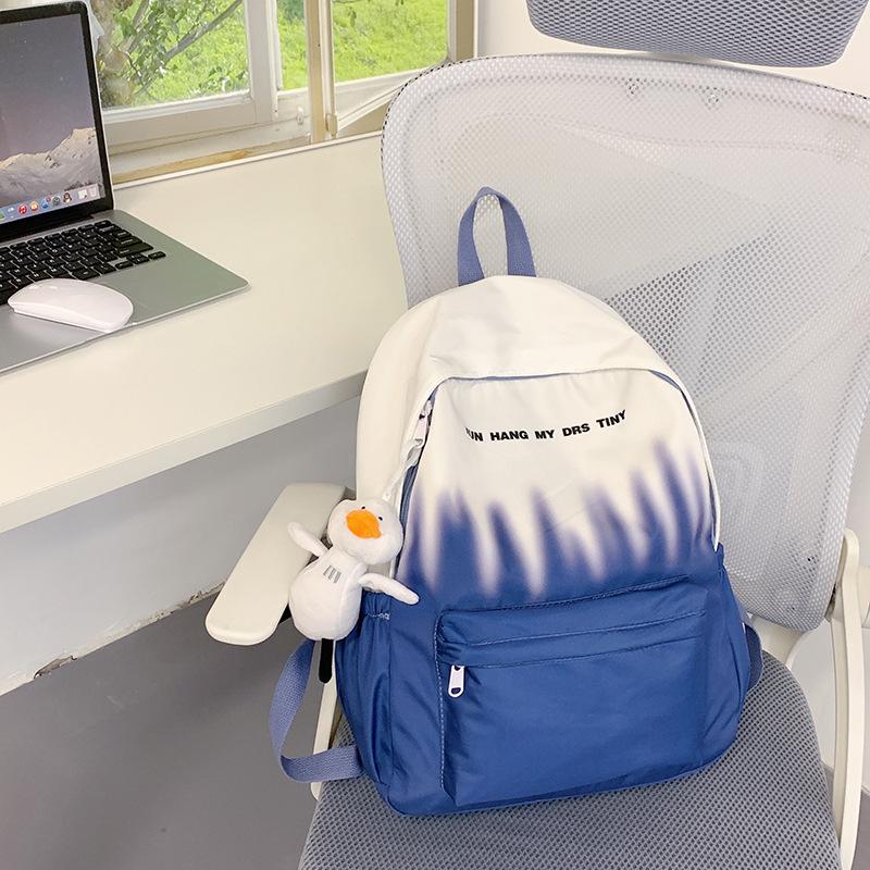 Graffiti Gradient Personality Schoolbag College Students' Backpacks for Boys and Girls' Travel Schoolbags Are Light and Large Capacity Backpacks.