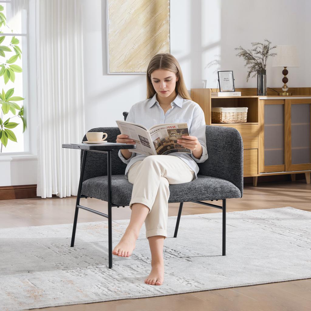 Modern single armchair with comfortable fabric backrest and two storage compartments, complemented by a practical side table.
