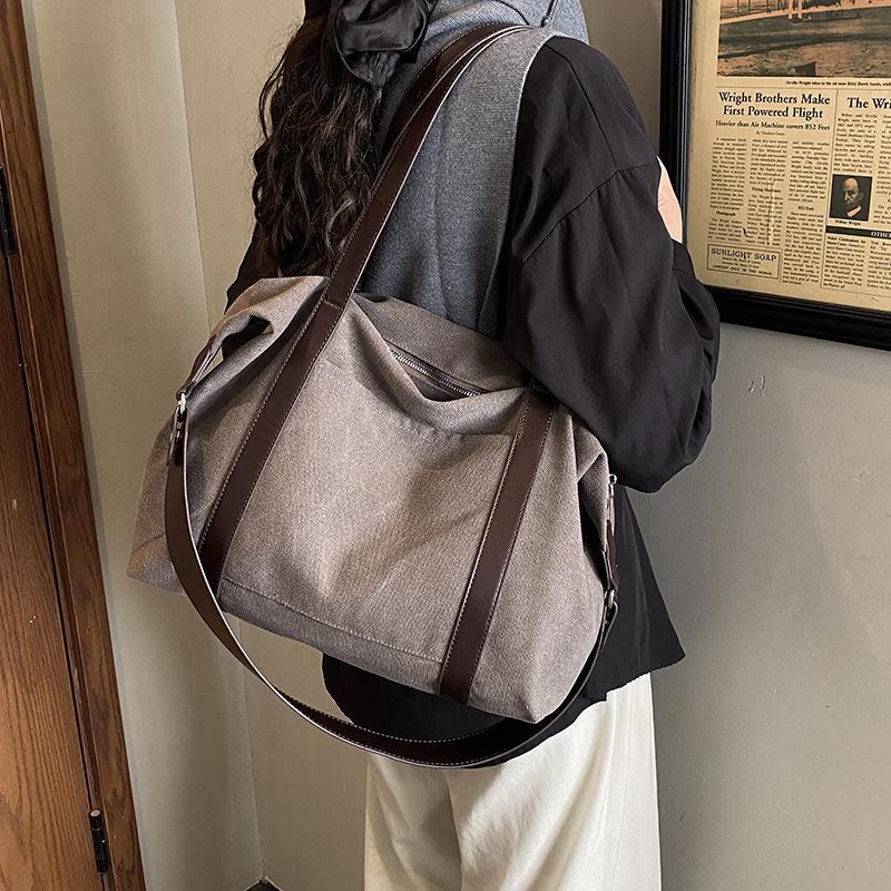 Stylish Canvas Shoulder Bag for Women with Wide Strap and Spacious Design