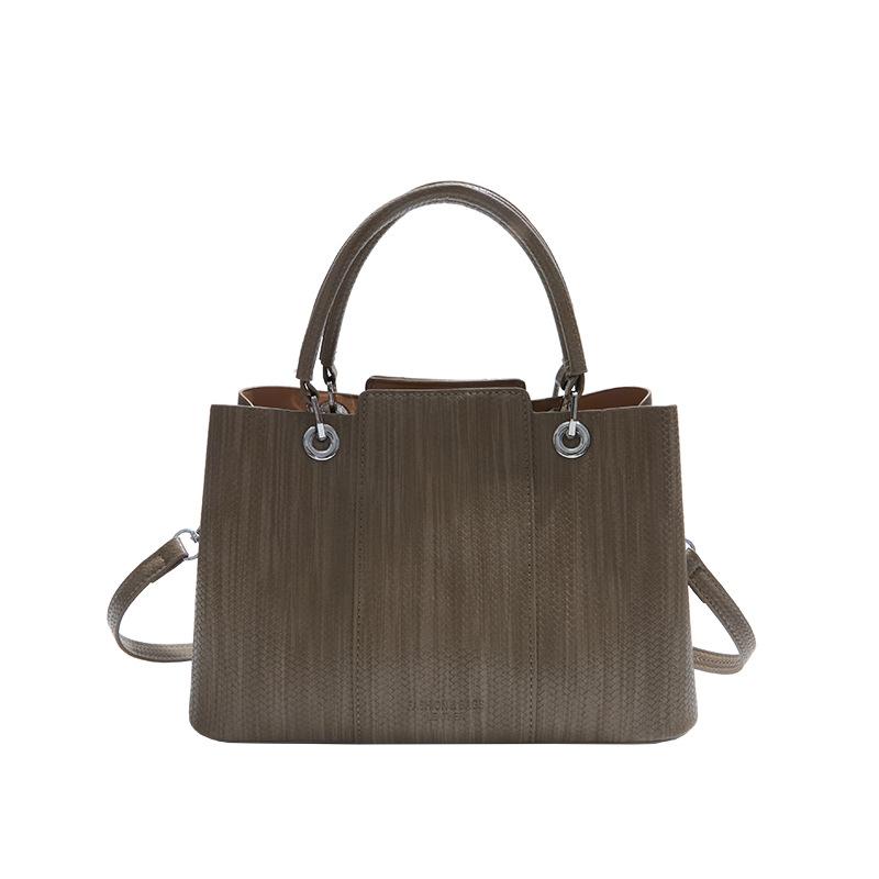 

Handheld briefcase autumn and winter retro versatile commuter tote bag 2025 new shoulder messenger mother bag