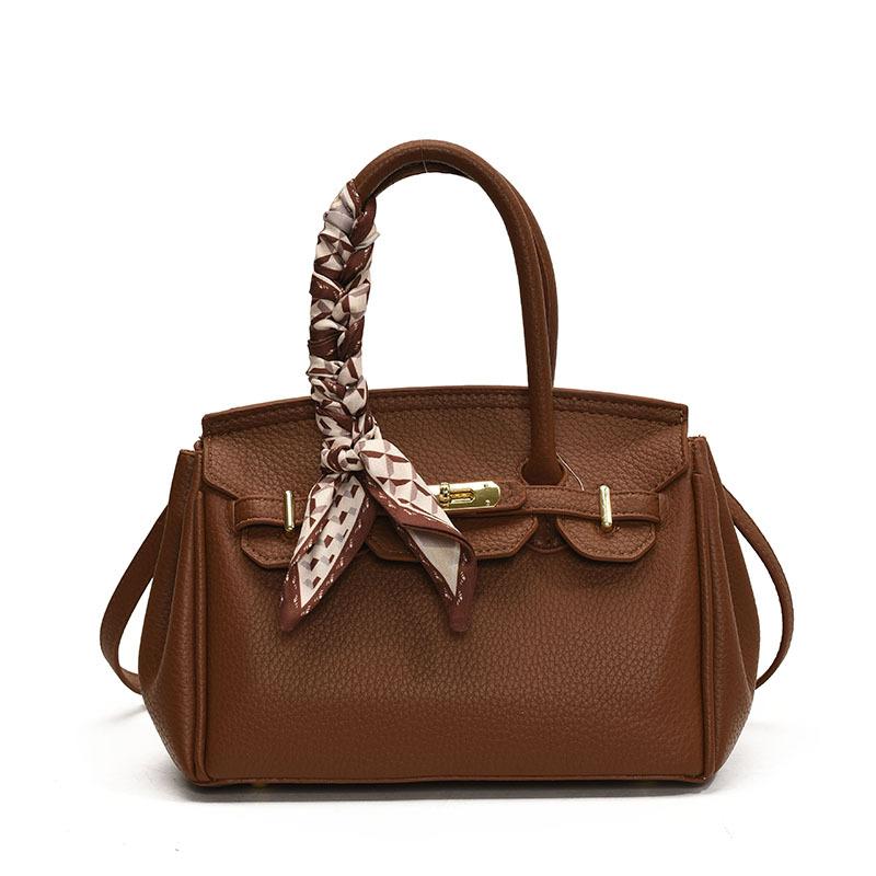 

Premium foreign style small bag 2025 new women s bag popular versatile messenger bag trendy fashion portable platinum bag Small коричневый