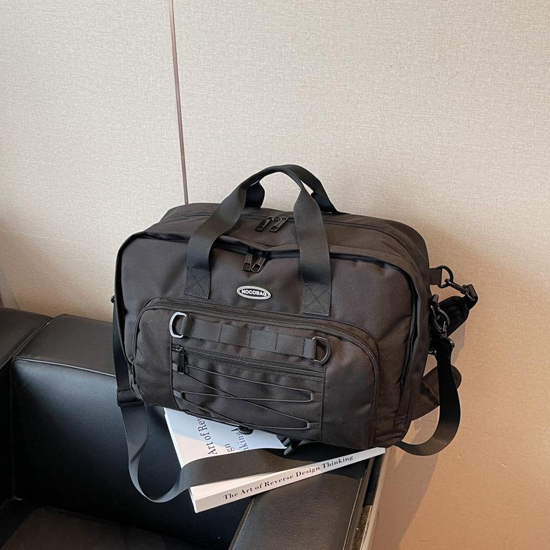 

Large capacity leisure sports fitness bag new versatile business trip short trip bag hand luggage bag чёрный