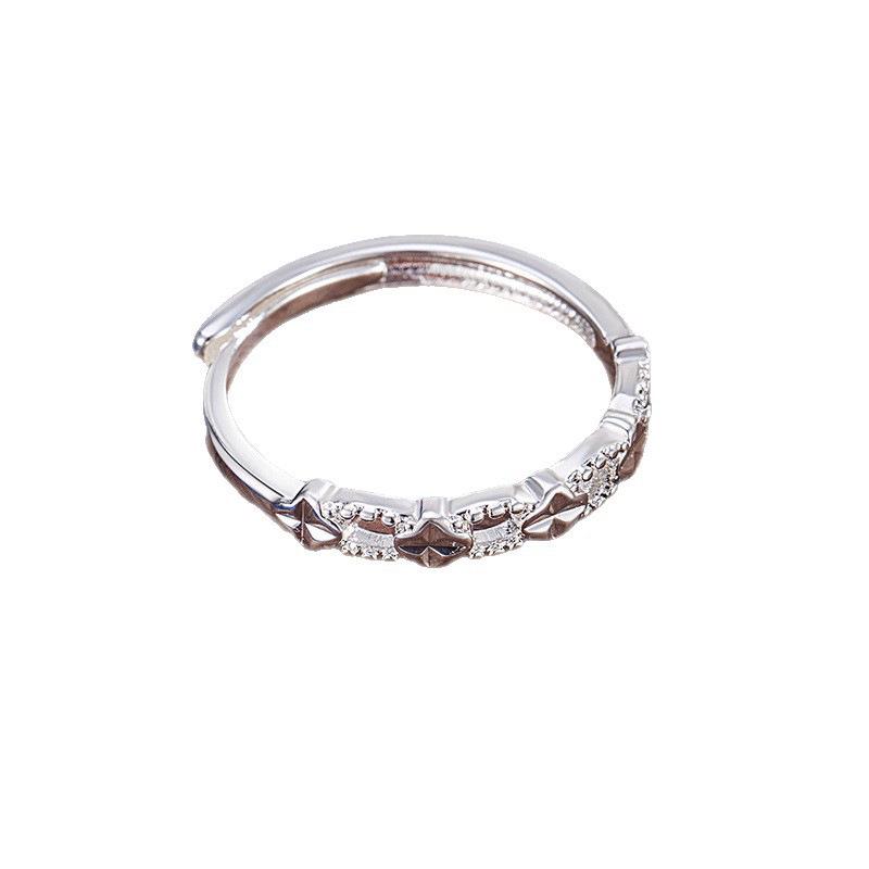 Fashionable Versatile Four-Leaf Clover Hollow Ring for Women - High-End Light Luxury Hand Jewelry 2025 Niche Design