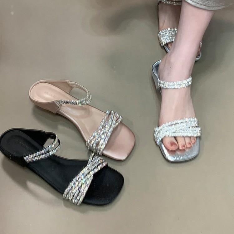 Berühmte Strasssteine mit Zehensandalen Damenmode Temperament Ein-Wort-Schleppe sexy schöne coole Hausschuhe