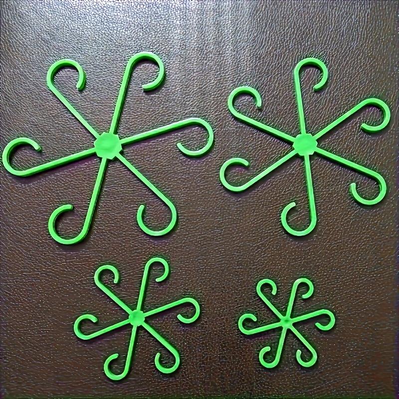 A set of four multi-functional plant support frames for plant growth, suitable for both indoor and outdoor use